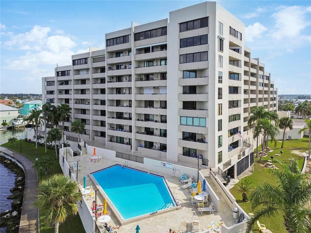 6035 Sea Ranch Drive, Unit 902 Hudson, FL 34667 - Photo 28 of 32 a picture of a building with outdoor space