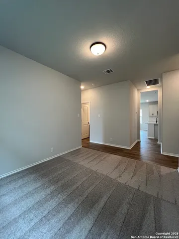 an empty room with a natural light