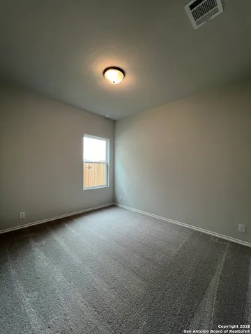 a bathroom with a toilet sink a mirror and a bathtub