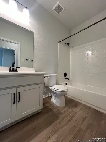 an empty room with closet area