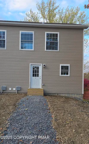 a view of backyard of house