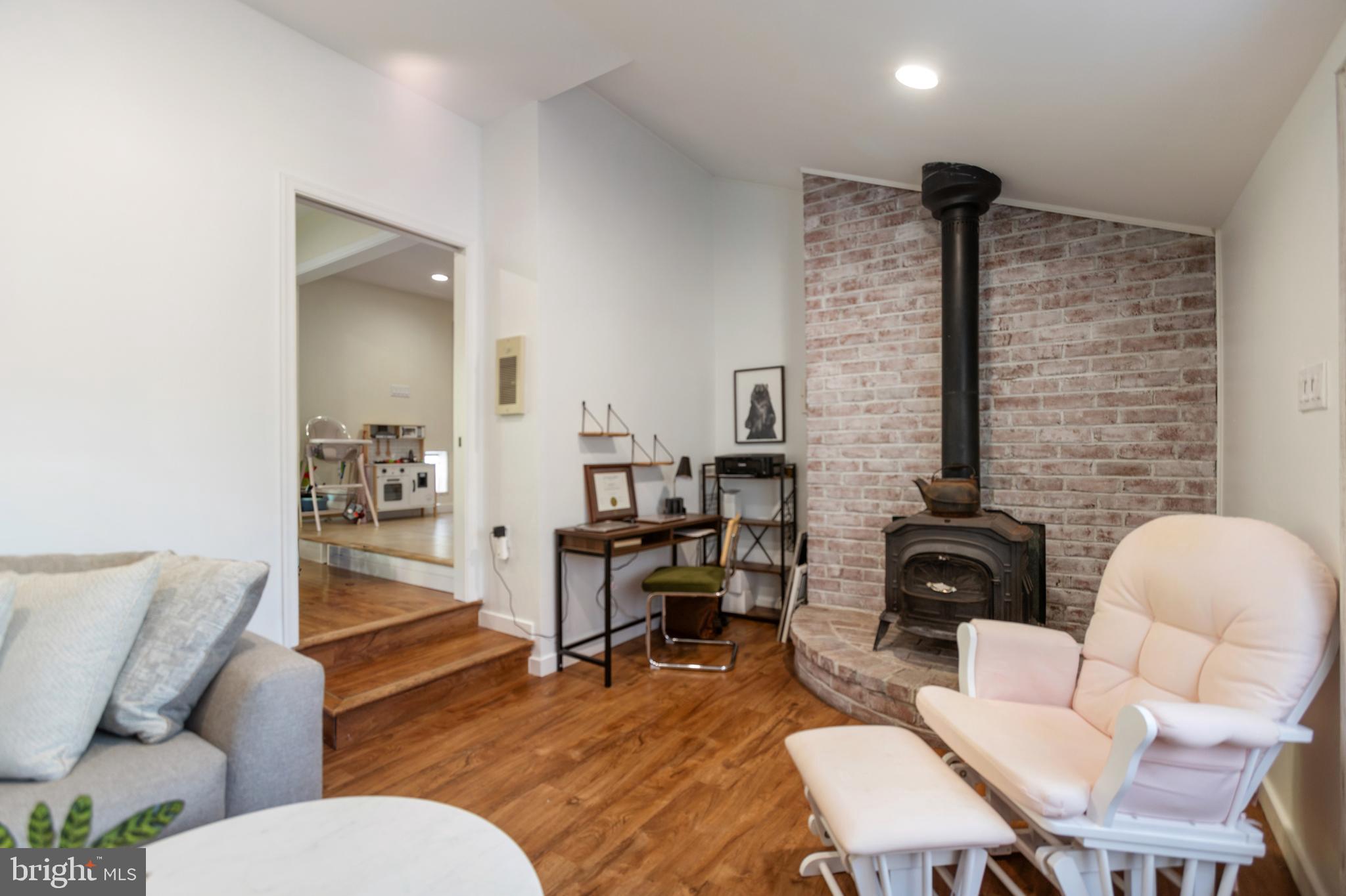 1801 North Hills Avenue Willow Grove, PA 19090 - Photo 14 of 20 a living room with furniture and a fireplace