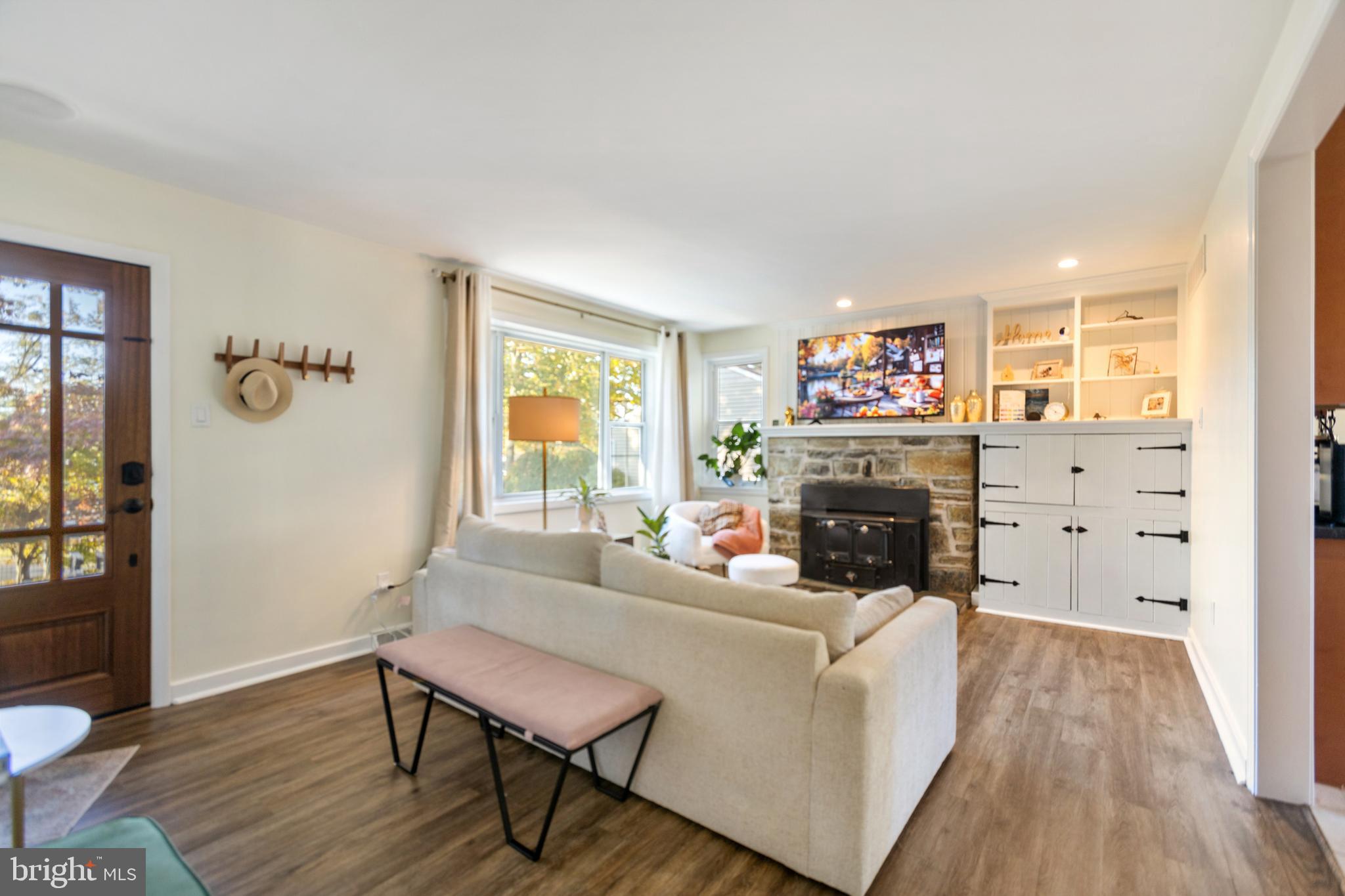 1801 North Hills Avenue Willow Grove, PA 19090 - Photo 4 of 20 a living room with furniture and a fireplace