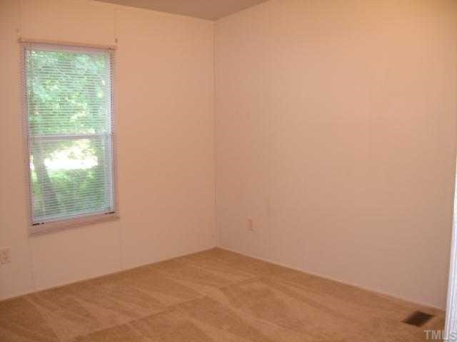 512 Fox Ridge Road Louisburg, NC 27549 - Photo 9 of 11 One of the Three spacious bedrooms.