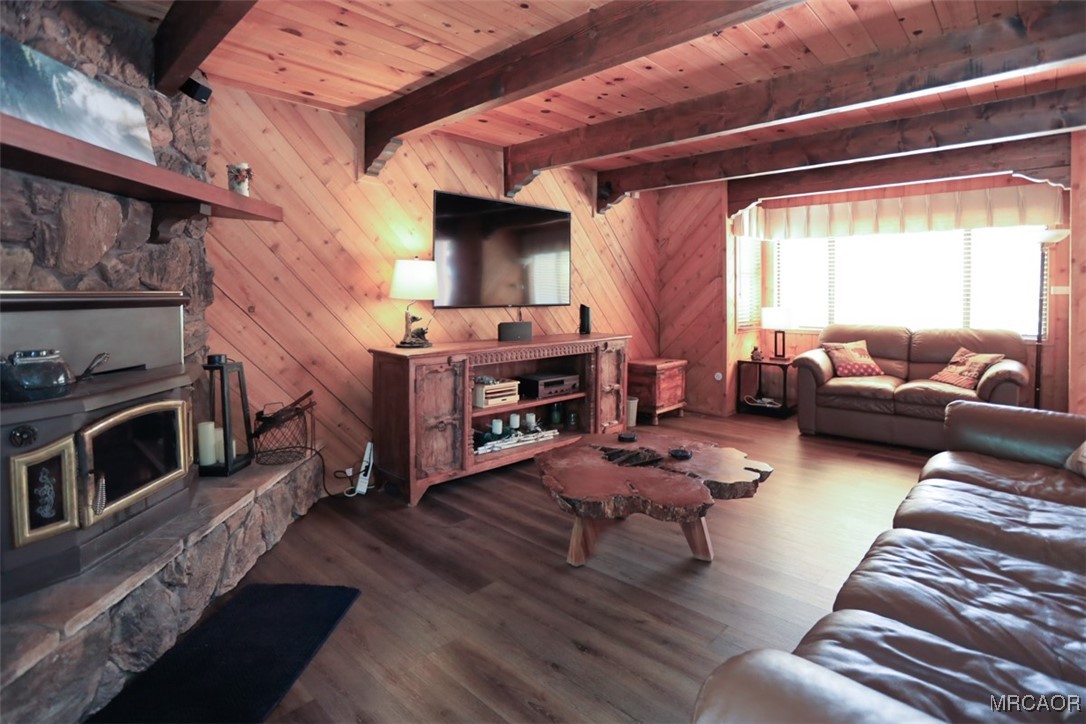 1201 Fox Farm Road Big Bear City, CA 92315 - Photo 13 of 16 a living room with furniture and a fireplace
