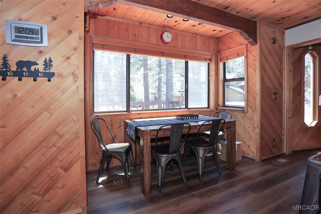 1201 Fox Farm Road Big Bear City, CA 92315 - Photo 2 of 16 a view of a dining room with furniture and wooden floor