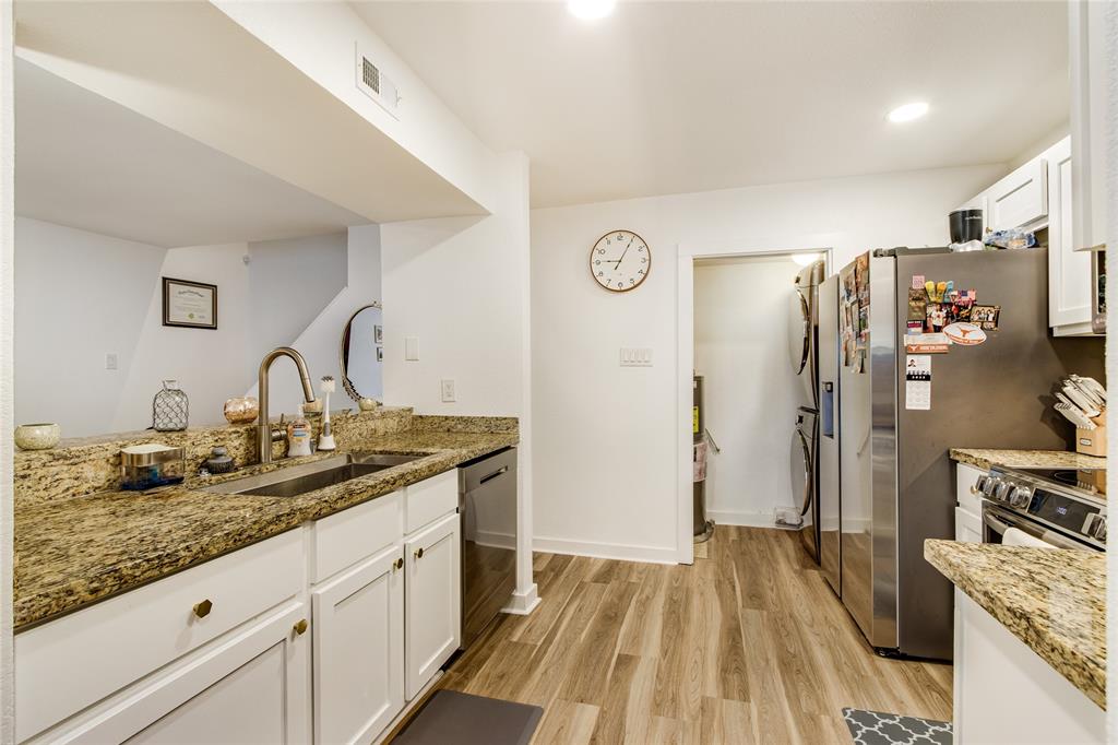 4777 Cedar Springs Road, Unit 7P Dallas, TX 75219 - Photo 12 of 28 a spacious bathroom with a granite countertop sink