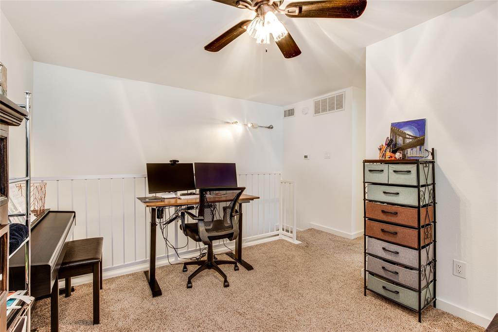 4777 Cedar Springs Road, Unit 7P Dallas, TX 75219 - Photo 18 of 28 a view of a workspace with furniture