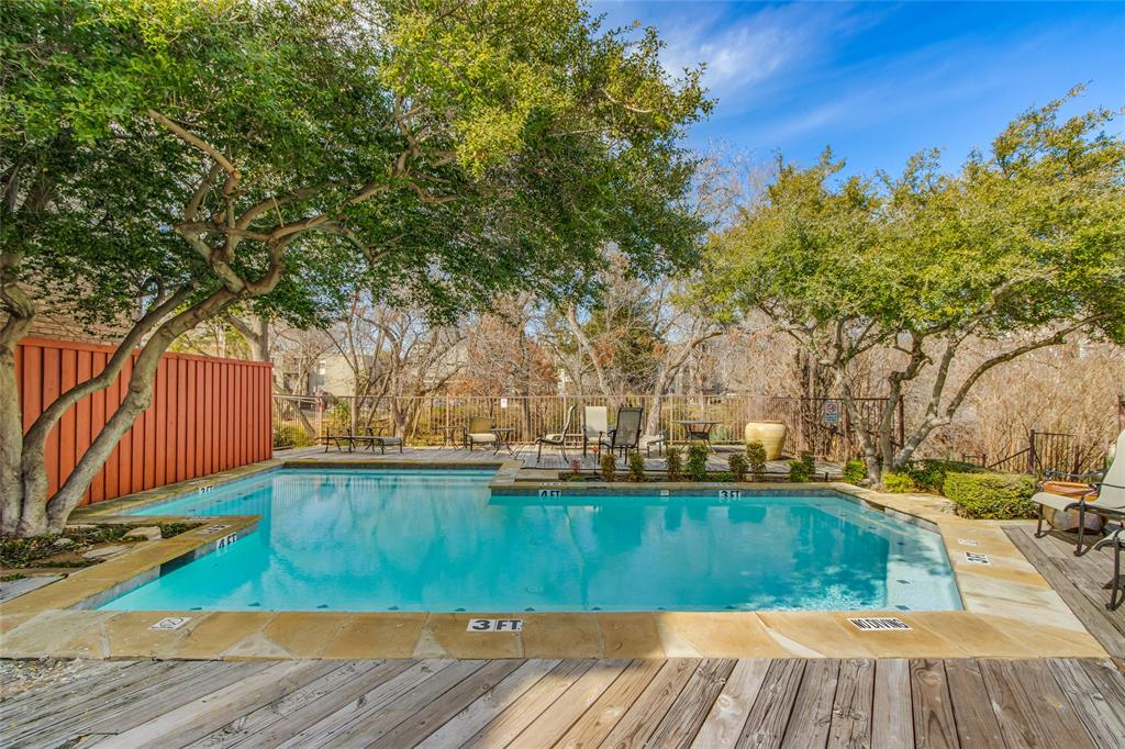 4777 Cedar Springs Road, Unit 7P Dallas, TX 75219 - Photo 28 of 28 a view of swimming pool with wooden fence