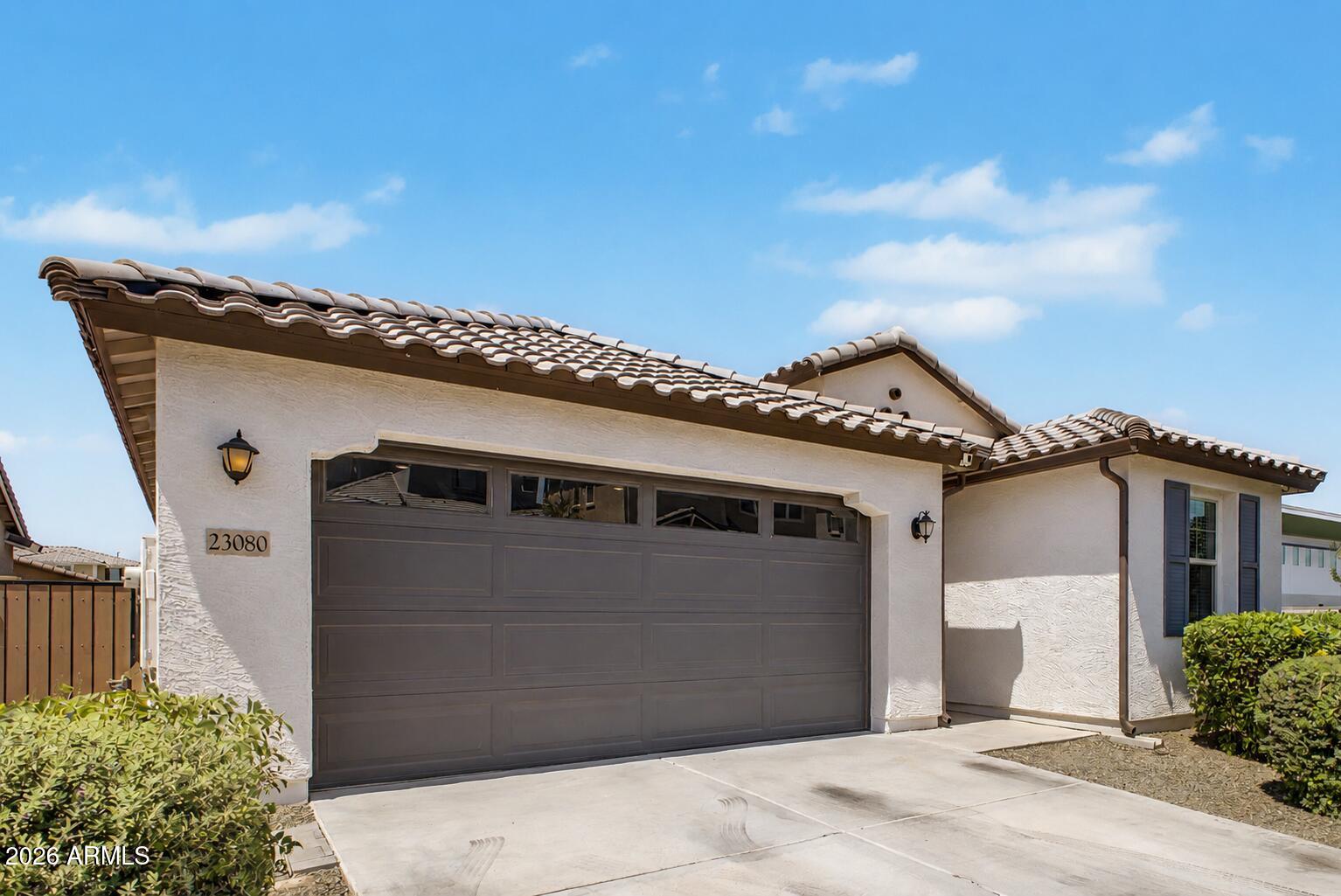 23080 East Stacey Road Queen Creek, AZ 85142 - Photo 1 of 42 a front view of a house