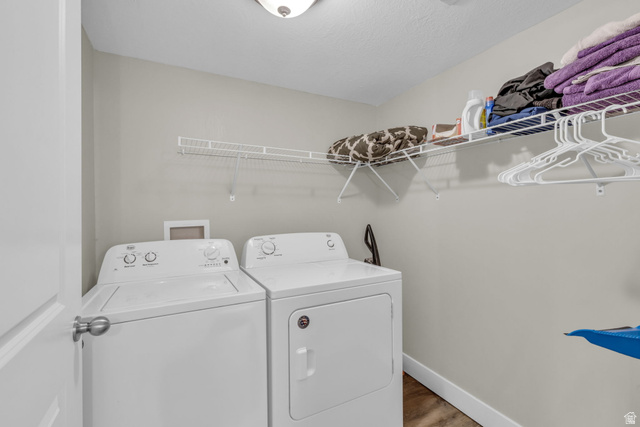 905 South Main Street, Unit G Layton, UT 84041 - Photo 11 of 36 Laundry room featuring light wood finished floors and washing machine and dryer