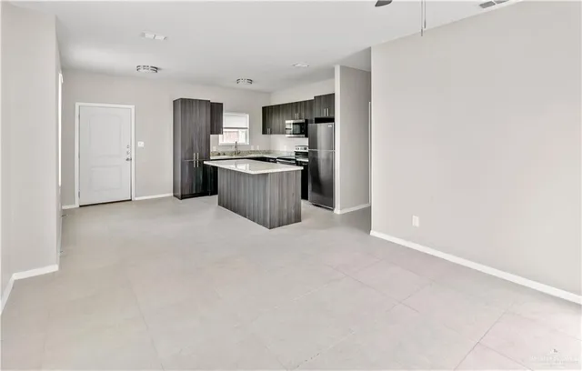 a view of a kitchen with a sink
