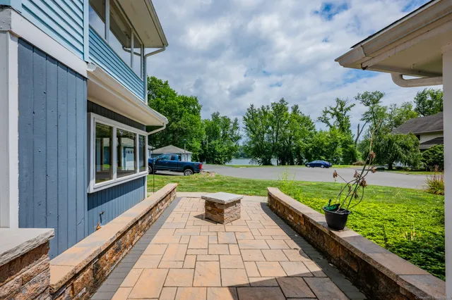 a view of swimming pool with a patio