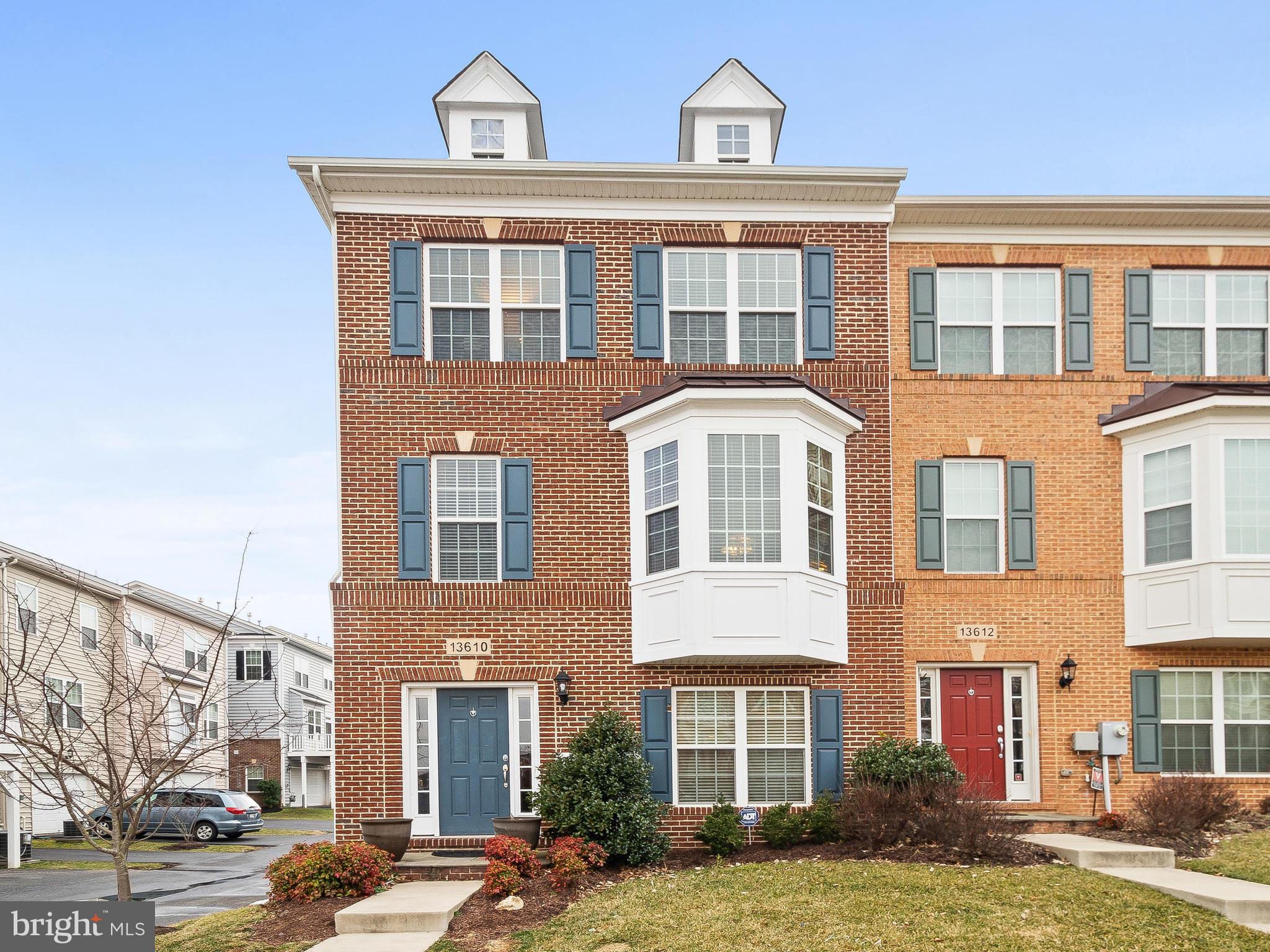 13610 Stargazer Lane Silver Spring, MD 20906 - Photo 1 of 43 a front view of a building with a garden