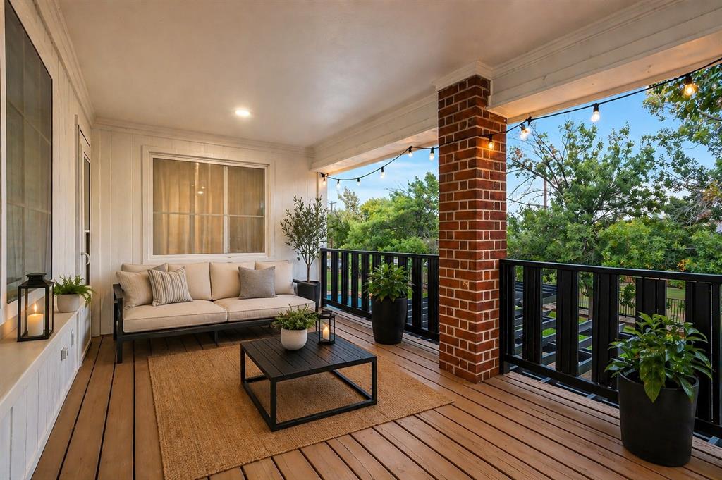 13510 Willow Springs Road Haslet, TX 76052 - Photo 26 of 34 a balcony with furniture and wooden floor