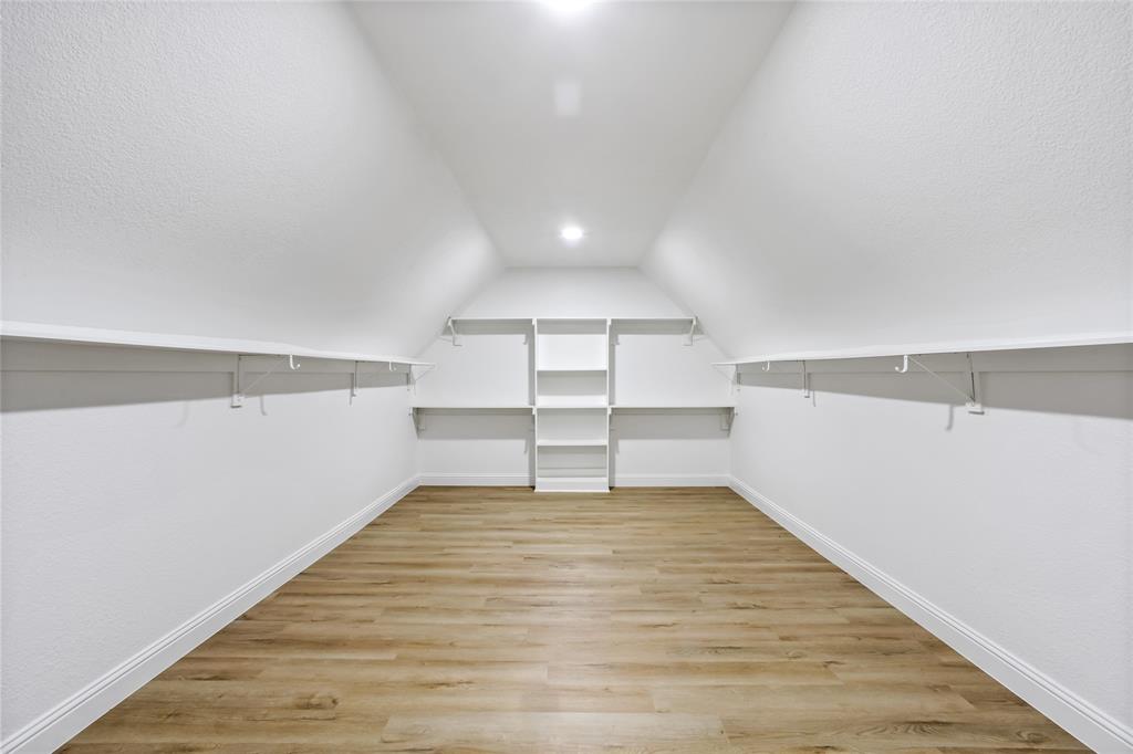 13510 Willow Springs Road Haslet, TX 76052 - Photo 30 of 39 Gorgeous primary bathroom with 2 separate walk-in closets. Coveted set up