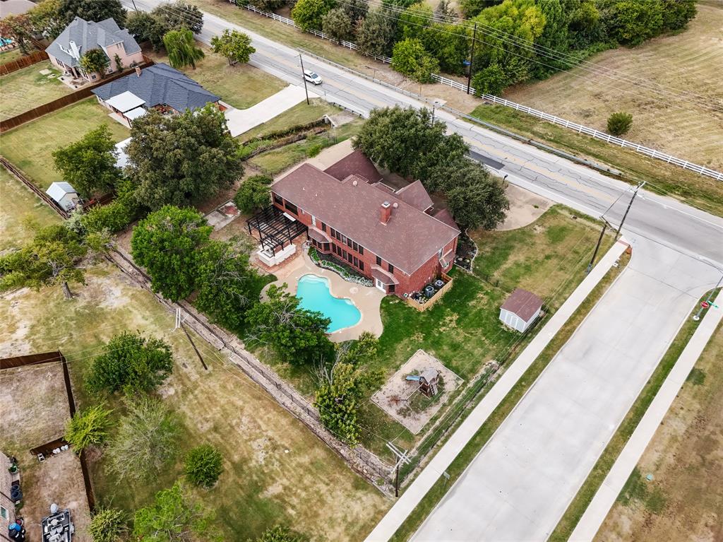 13510 Willow Springs Road Haslet, TX 76052 - Photo 32 of 34 an aerial view of lake and residential houses with outdoor space