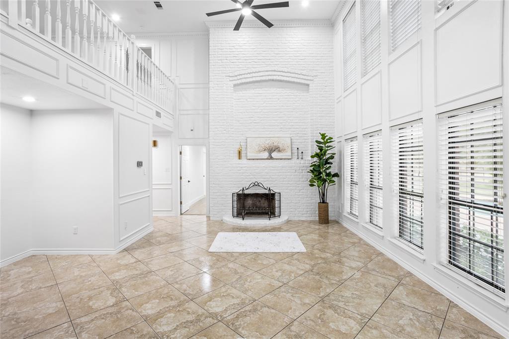 13510 Willow Springs Road Haslet, TX 76052 - Photo 5 of 39 a view of an entryway with a fireplace