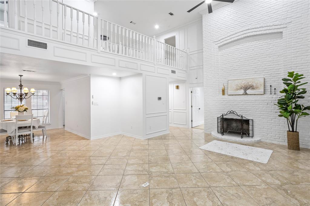 13510 Willow Springs Road Haslet, TX 76052 - Photo 6 of 39 a view of a livingroom with furniture and a fireplace