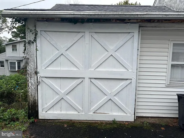 a view of outdoor space garage and window