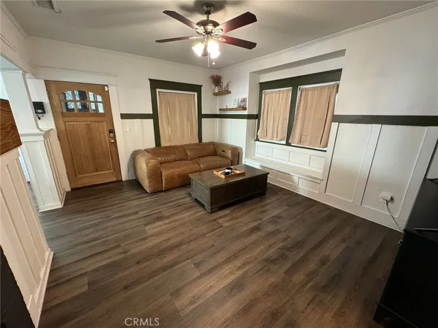 a kitchen with stainless steel appliances a stove a sink and cabinets