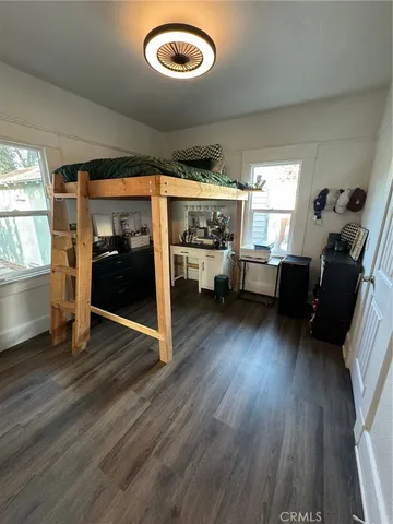 a bathroom with a sink mirror vanity and toilet