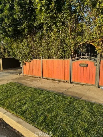a view of a house with a tree