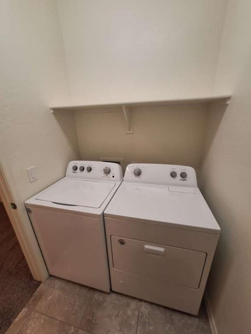 18541 West Mescal Street Surprise, AZ 85388 - Photo 18 of 31 a utility room with dryer and washer