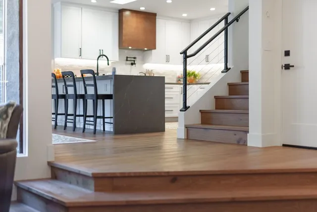 a view of entryway and hall with wooden floor