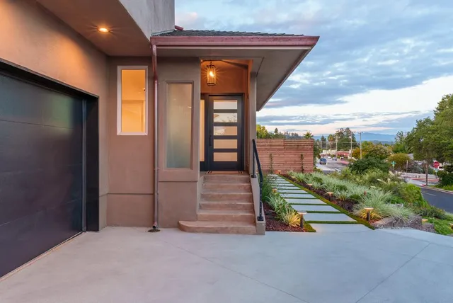 a view of potted plants in front of building