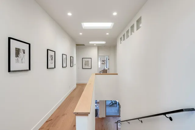 a view of a hallway with workspace