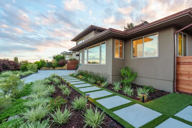 a backyard of a house with lots of green space