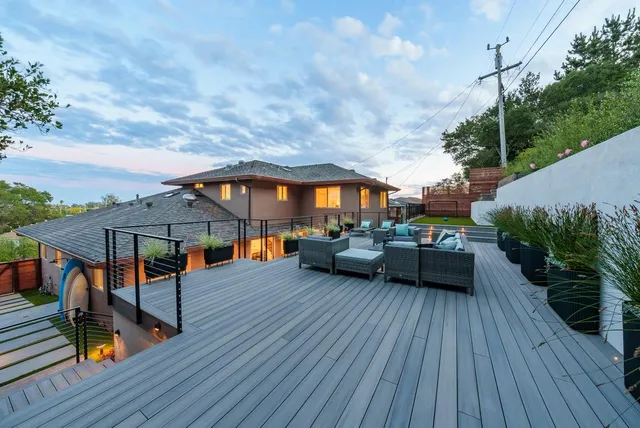 a view of a terrace with sitting area