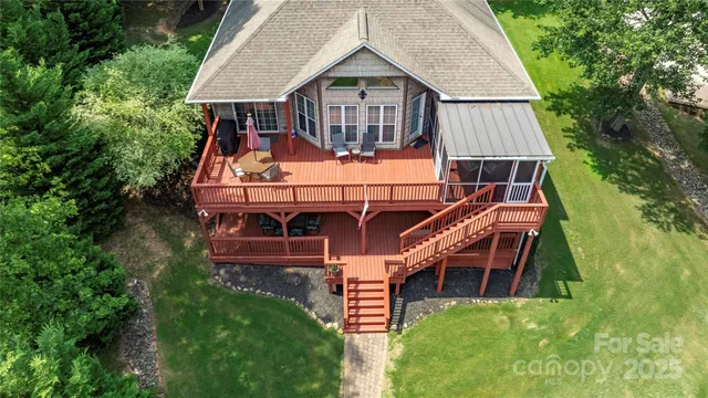 an aerial view of a house with swimming pool