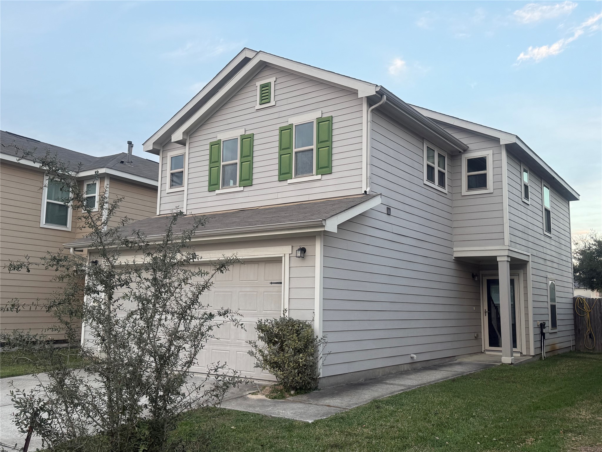 1119 Grassy View Drive Houston, TX 77073 - Photo 1 of 28 a front view of a house with a garden
