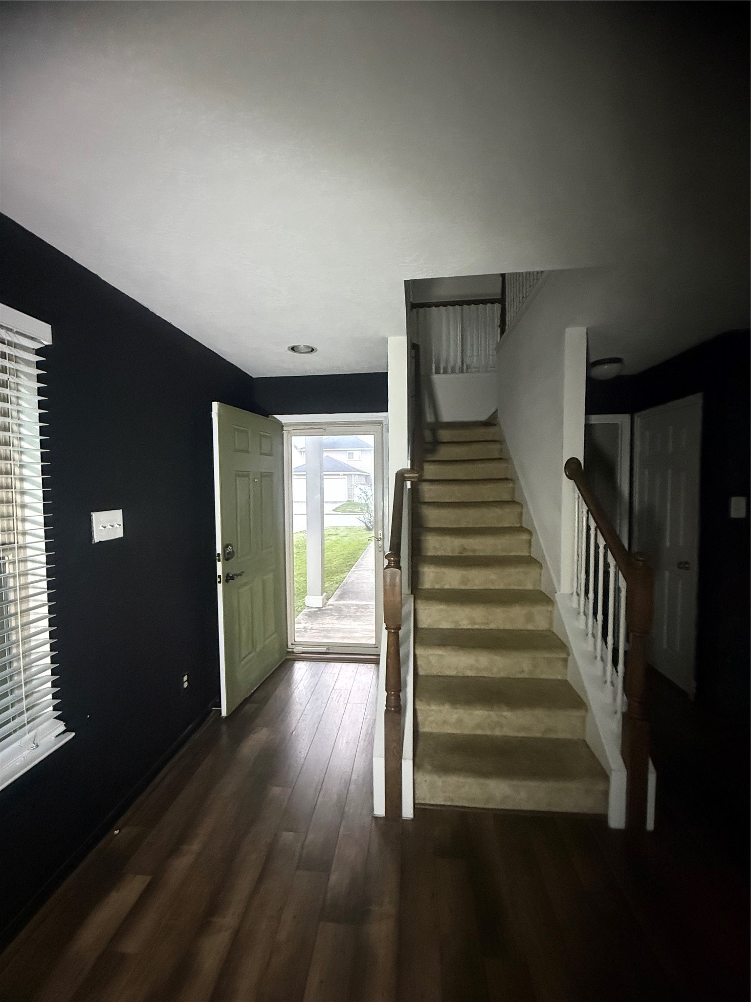 1119 Grassy View Drive Houston, TX 77073 - Photo 11 of 28 a view of entryway and hall with wooden floor