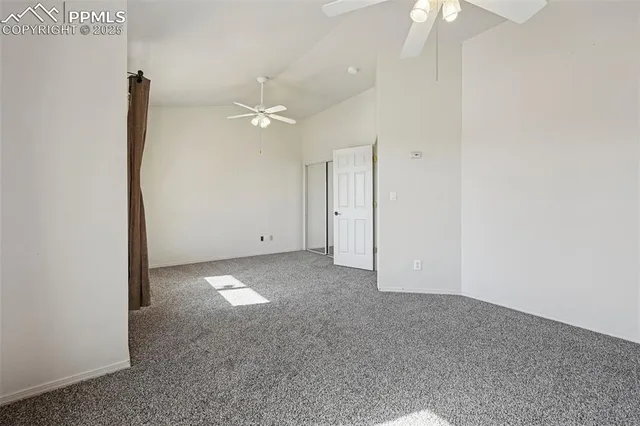 a bathroom with a granite countertop sink toilet and a mirror