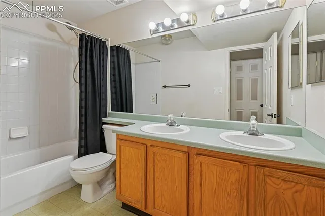 a view of balcony with wooden fence and floor
