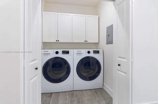 a utility room with dryer and washer