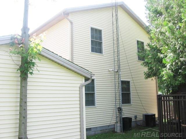 7314 Longfellow Road Lexington, MI 48450 - Photo 4 of 32 Rear of Home