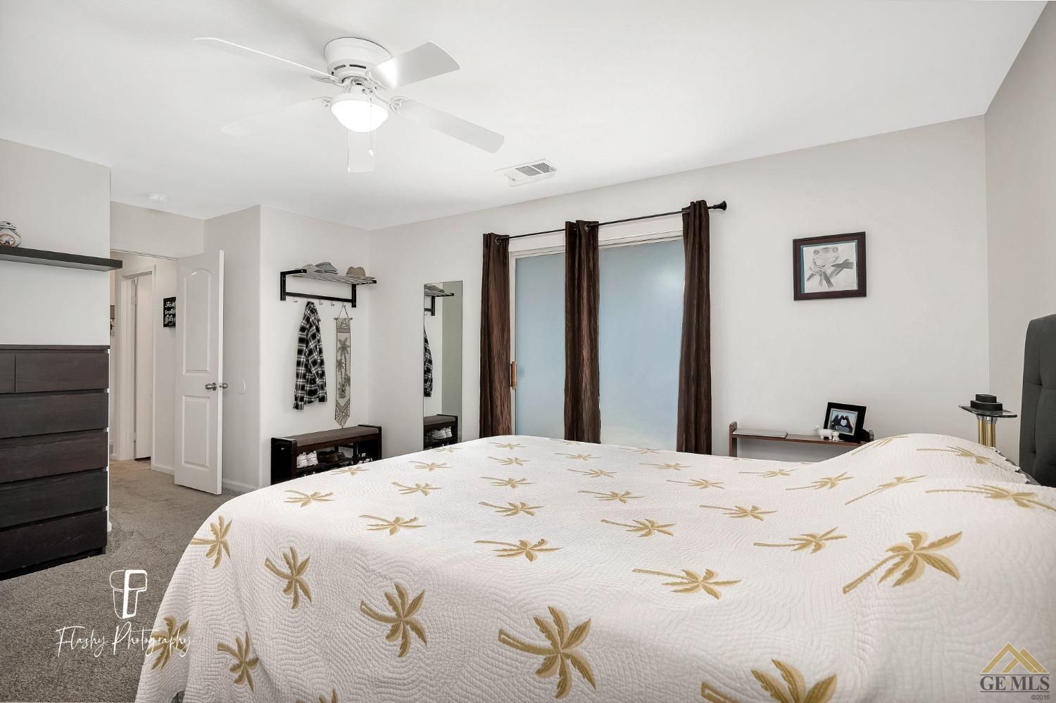 Undisclosed Address Bakersfield, CA 93308 - Photo 13 of 21 a bedroom with a bed and a closet