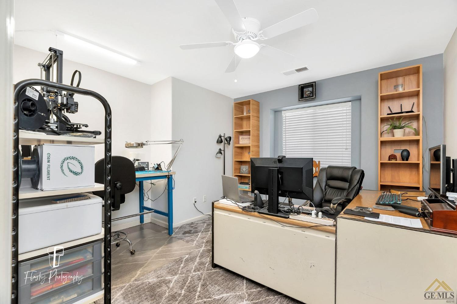 Undisclosed Address Bakersfield, CA 93308 - Photo 16 of 21 a view of a workspace with furniture