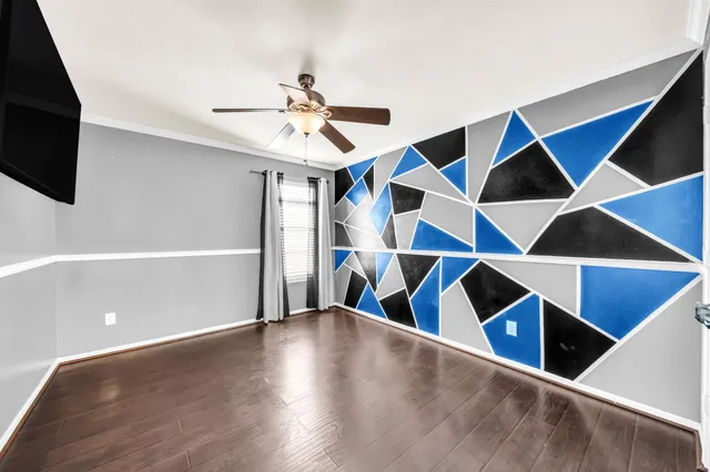 a view of an entryway with wooden floor