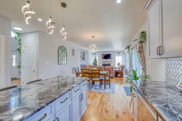 a view of a living room and dining room