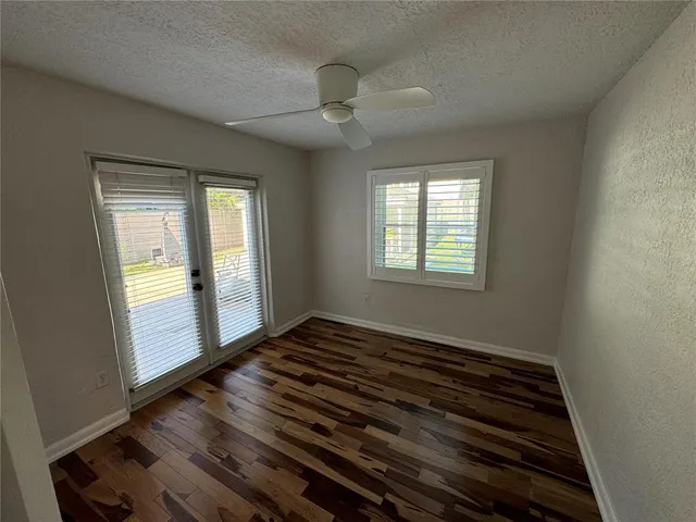 a view of an empty room and window