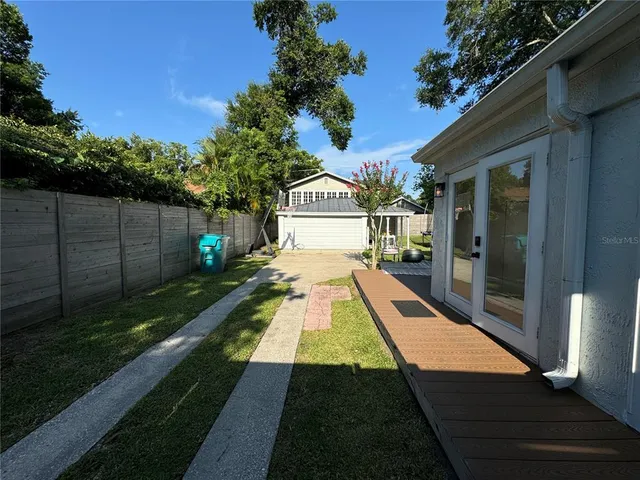 a view of swimming pool with lounge chair