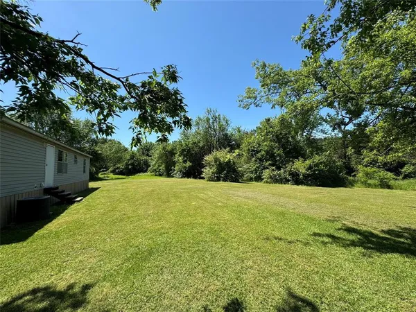 a view of outdoor space and yard
