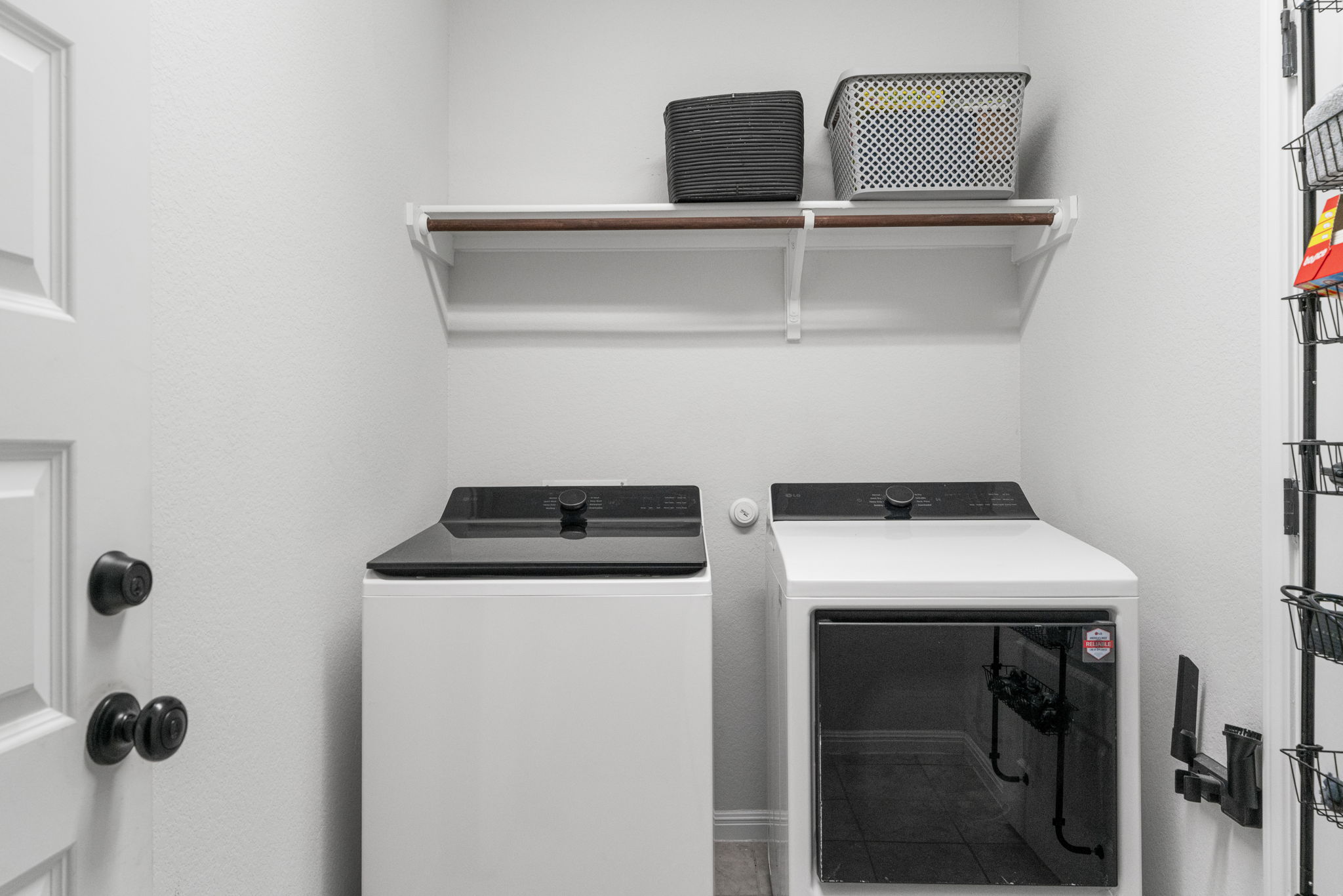 19412 Forman Drive Pflugerville, TX 78660 - Photo 26 of 34 The dedicated laundry room provides a convenient and functional space for everyday household tasks.