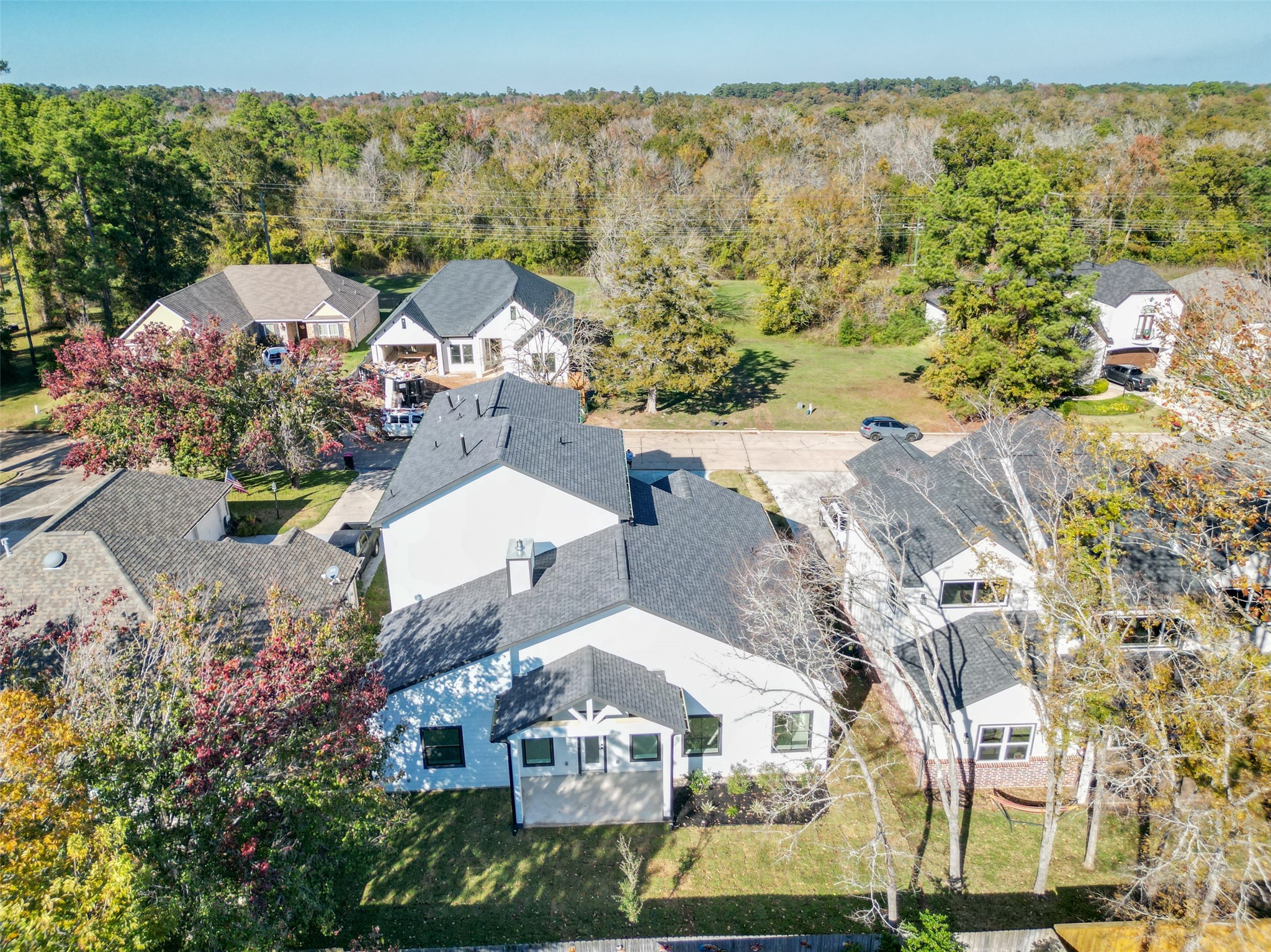 75 Wick Willow Road Montgomery, TX 77356 - Photo 28 of 46 an aerial view of a house with a mountain