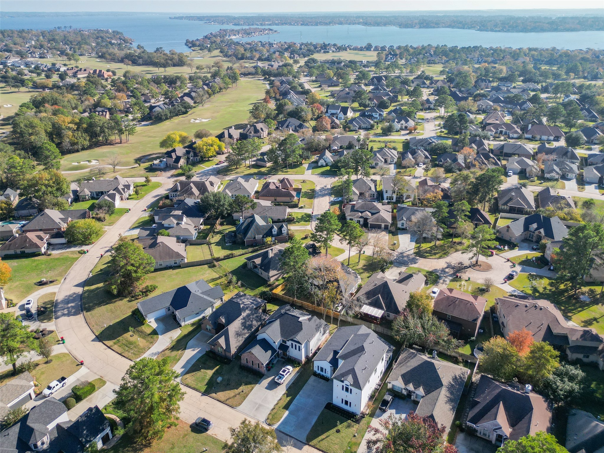 75 Wick Willow Road Montgomery, TX 77356 - Photo 35 of 46 an aerial view of a city with lots of residential buildings